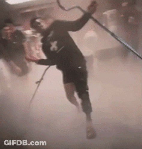 Bearded Man In Grey Hoodie Looking At Camera GIF