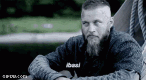 Bearded Man In Hammock Hands On Hips GIF