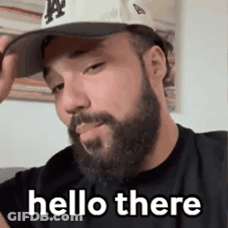 Bearded Man In Hat And Black Shirt Hello There GIF