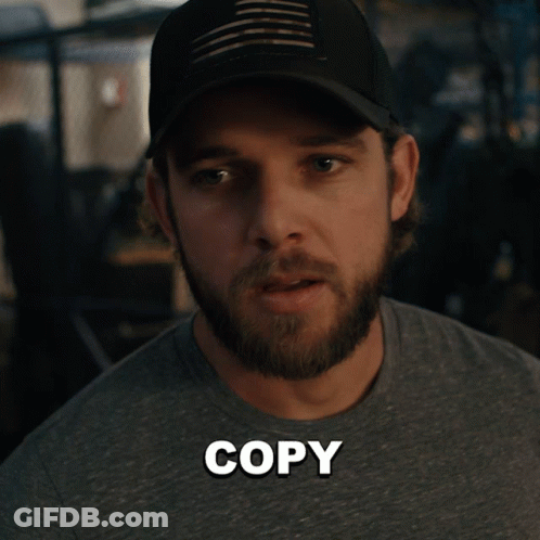 Bearded Man In Hat And Copy Shirt GIF