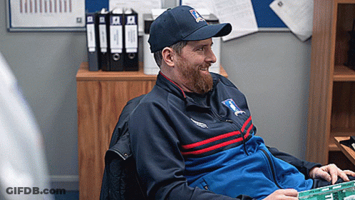 Bearded Man In Hat And Jacket Saying TSC GIF