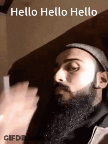 Bearded Man In Hat And Jacket Says Hello Hello Hello GIF
