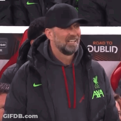 Bearded Man In Hat And Jacket Sitting In Stadium GIF