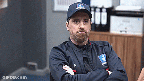 Bearded Man In Hat And Jacket With Arms Crossed GIF