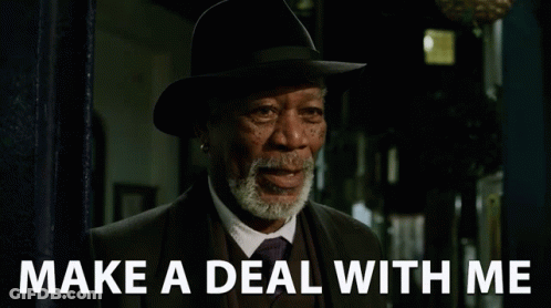 Bearded Man In Hat And Suit Saying Make A Deal With Me GIF