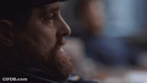 Bearded Man In Hat Looking GIF