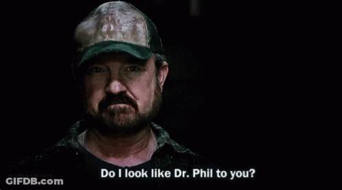 Bearded Man In Hat Talking To Another GIF