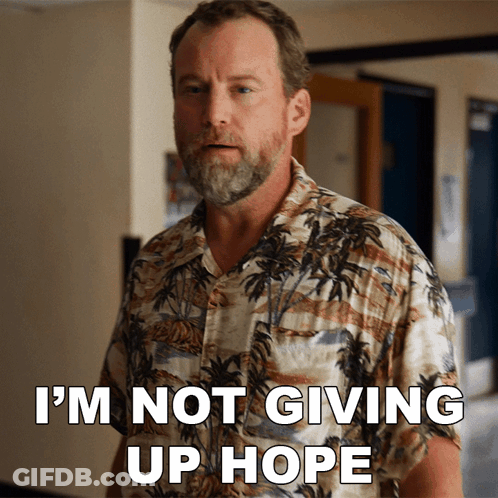 Bearded Man In Hawaiian Shirt Says I'm Not Giving Up Hope GIF