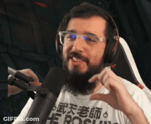 Bearded Man In Headphones And Hero Shirt GIF