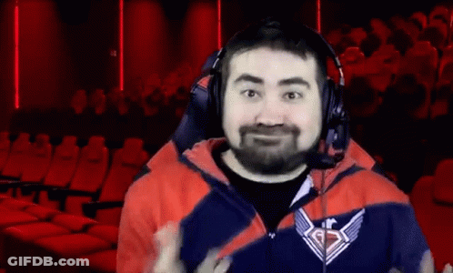 Bearded Man In Headphones And Logo Jacket Facing Crowd GIF