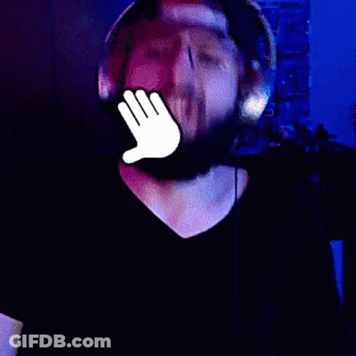 Bearded Man In Headphones Covering Mouth GIF