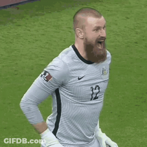 Bearded Man In Jersey Number 12 GIF