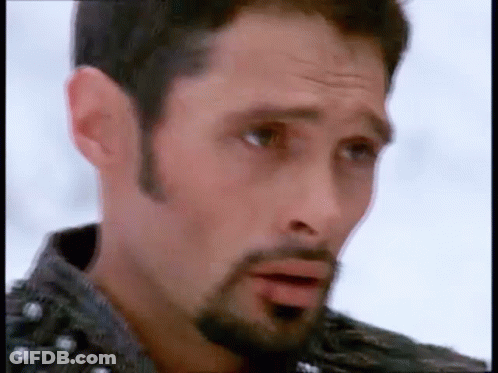 Bearded Man In Leather Jacket Making Funny Face GIF