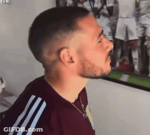 Bearded Man In Maroon Shirt With White Stripes GIF