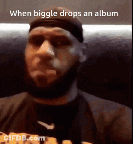 Bearded Man In Nike Shirt And Headband GIF