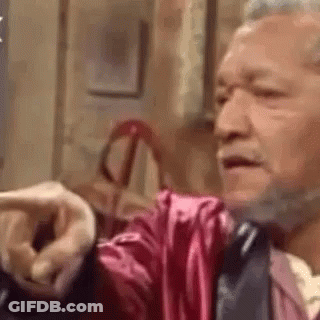 Bearded Man In Pink Robe Pointing GIF