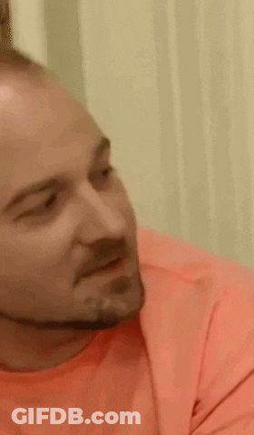 Bearded Man In Pink Shirt Making Face GIF