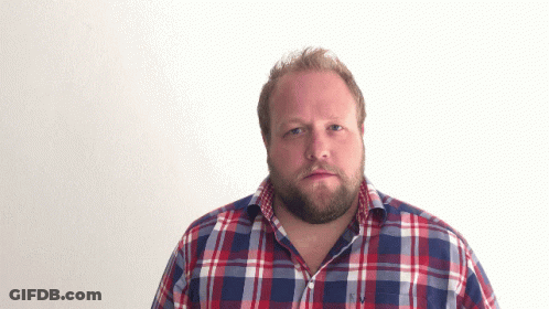 Bearded Man In Plaid Shirt With V Collar GIF