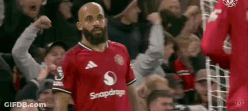 Bearded Man In Red Adidas Shirt Before Crowd GIF