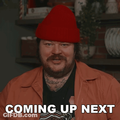 Bearded Man In Red Beanie Says Coming Up Next GIF