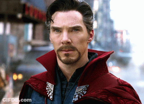 Bearded Man In Red Cape And Silver Brooch GIF