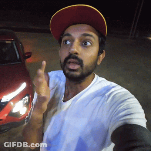 Bearded Man In Red Hat And White Shirt GIF