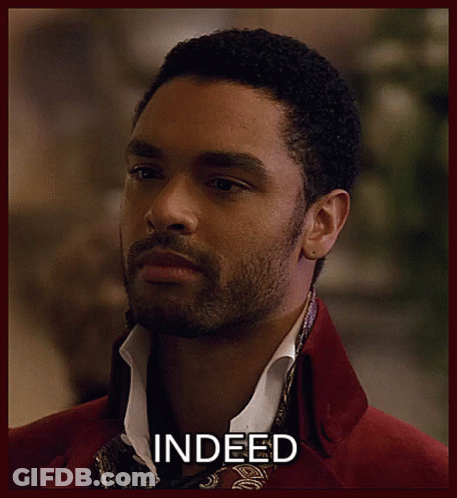 Bearded Man In Red Jacket And Scarf Saying Indeed GIF