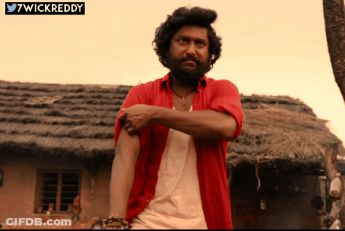 Bearded Man In Red Shirt By Hut GIF