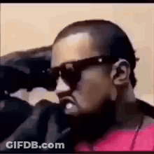 Bearded Man In Red Shirt Looking Through Binoculars GIF