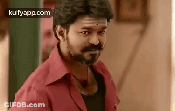 Bearded Man In Red Shirt Making Funny Face GIF