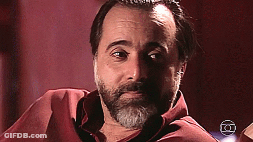 Bearded Man In Red Shirt With Circle Around Head GIF