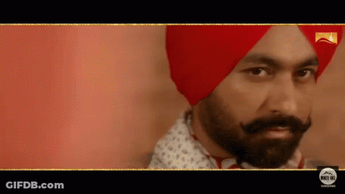 Bearded Man In Red Turban And White Shirt GIF