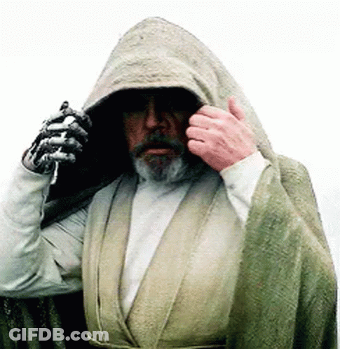 Bearded Man In Robe Holding Lightsaber GIF