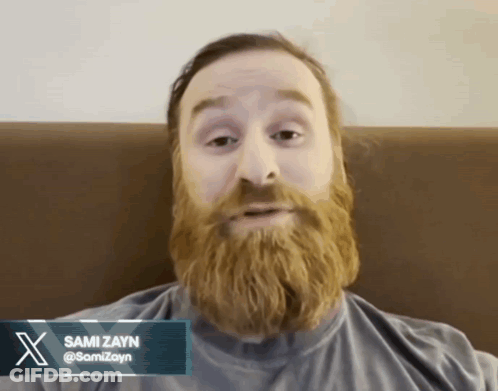 Bearded Man In Sami Zayn Shirt GIF