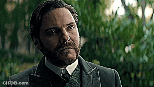 Bearded Man In Suit And Tie Looking At Camera GIF