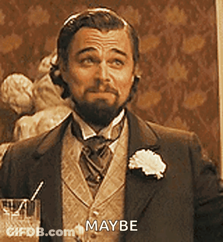 Bearded Man In Suit Holding Glass Of Water GIF
