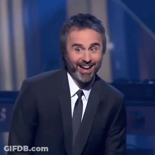 Bearded Man In Suit Smiling GIF