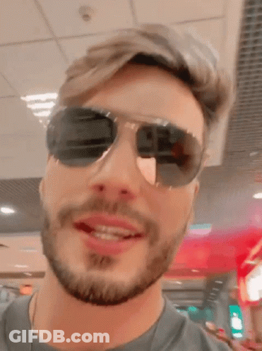 Bearded Man In Sunglasses And Grey Shirt GIF