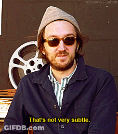 Bearded Man In Sunglasses And Hat That's Not Very Subtle GIF
