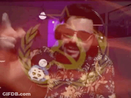 Bearded Man In Sunglasses And Hawaiian Shirt Holding Medal GIF