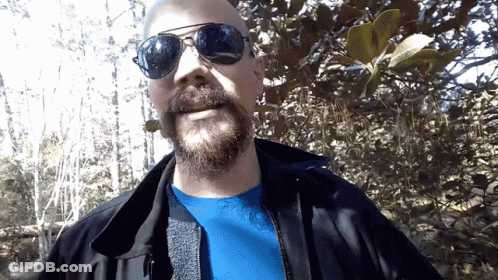 Bearded Man In Sunglasses And Jacket GIF