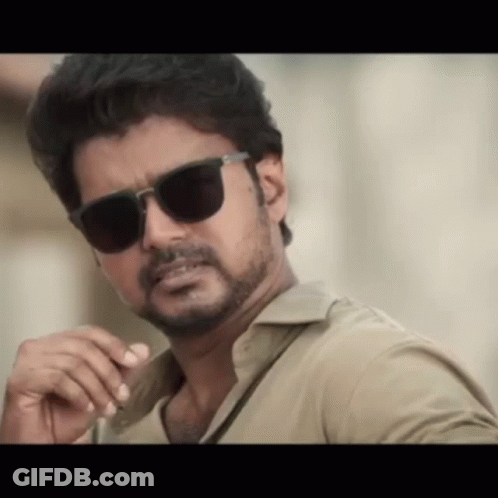 Bearded Man In Sunglasses And Khaki Shirt GIF