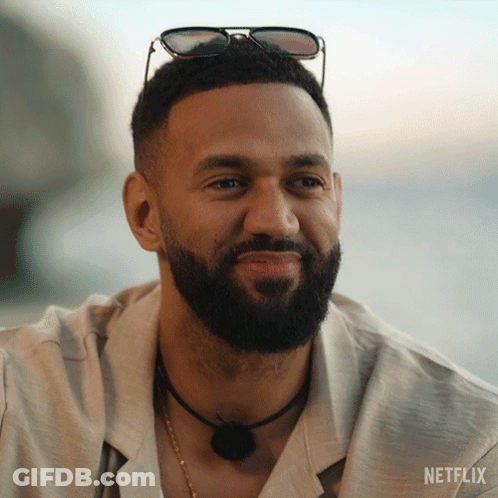 Bearded Man In Sunglasses With Netflix Necklace GIF