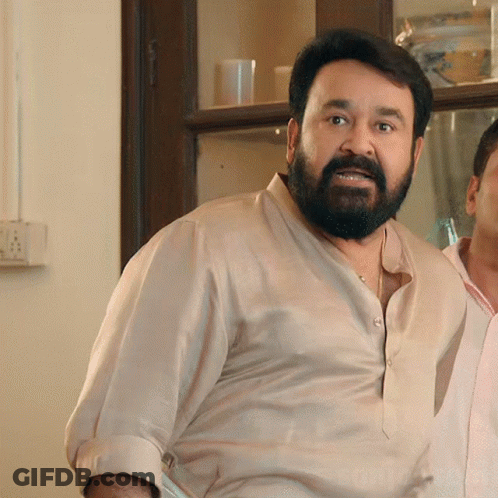 Bearded Man In Tan Shirt GIF
