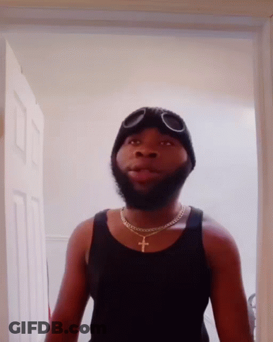 Bearded Man In Tank Top And Goggles GIF