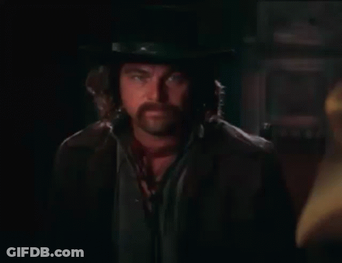 Bearded Man In Top Hat Giving Middle Finger GIF