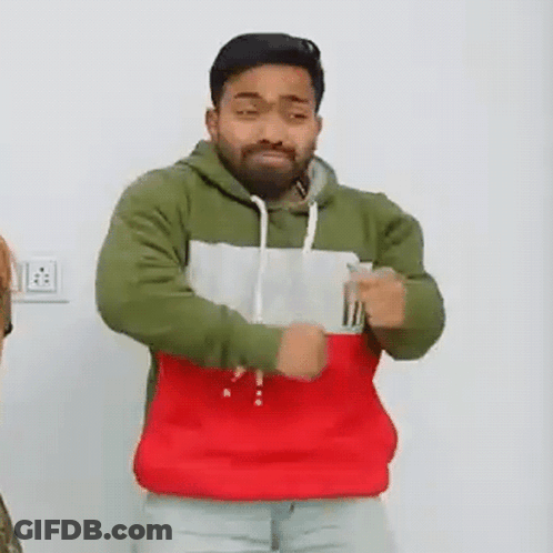 Bearded Man In Tricolor Hoodie Dancing GIF