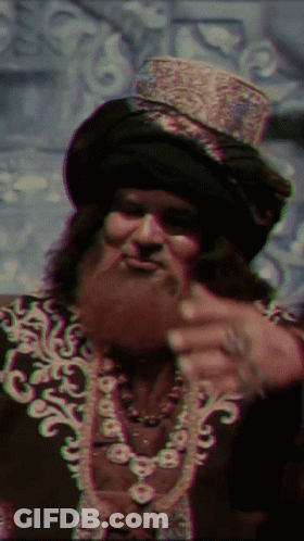 Bearded Man In Turban And Top Hat GIF