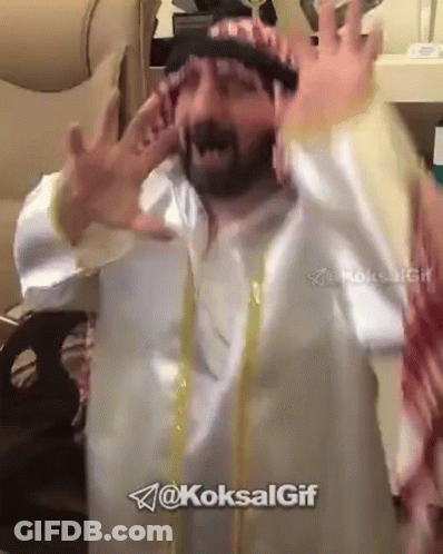 Bearded Man In Turban And White Robe GIF