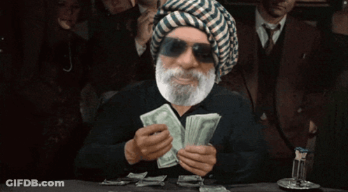 Bearded Man In Turban Holding Money GIF